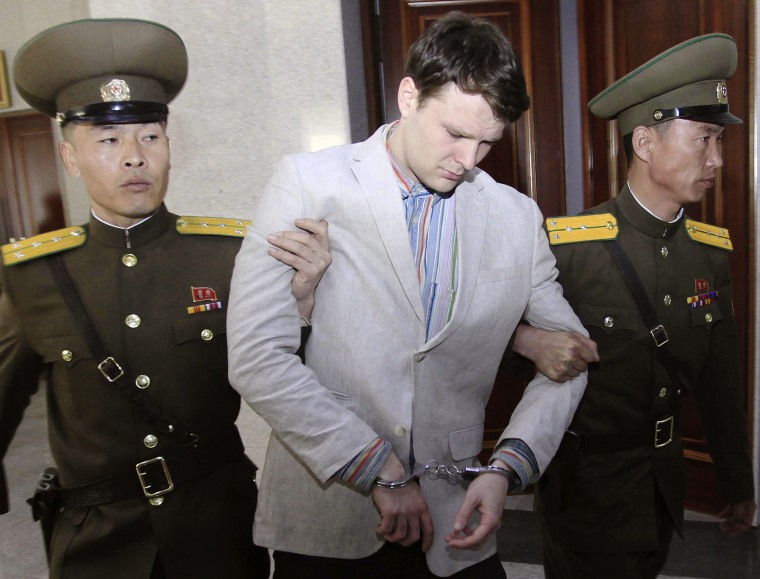 Image: Otto Warmbier is escorted at the Supreme Court in Pyongyang