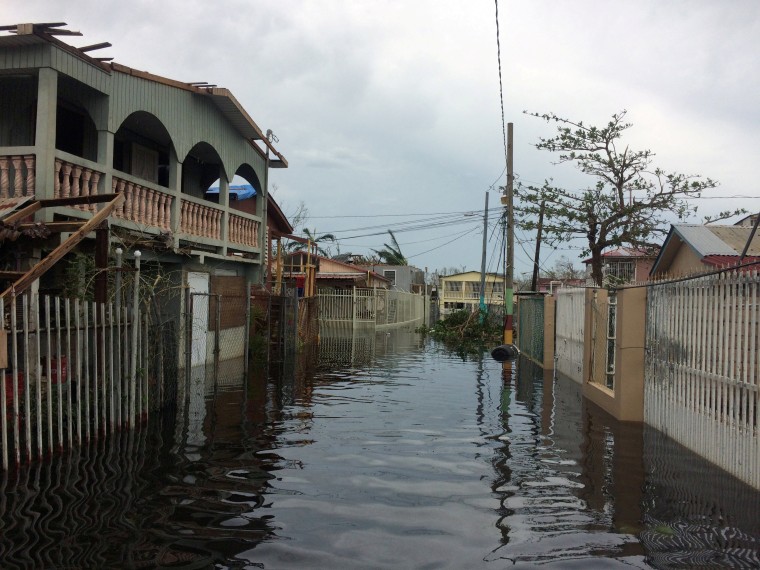 Image: FILE PHOTO: A flooded street is seen in the Juana Matos neighbourhood in Catano municipality after Hurricane Maria