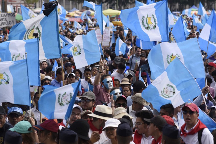 Image: Protesters gather at Constitution Square in front of the National Palace in Guatemala City
