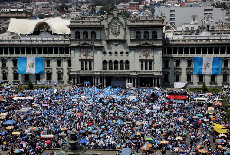 Image: Anti-government protesters participate in a march in Guatemala City