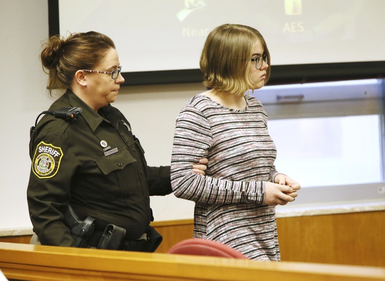 Image: Morgan E. Geyser is escorted into a Waukesha County Court