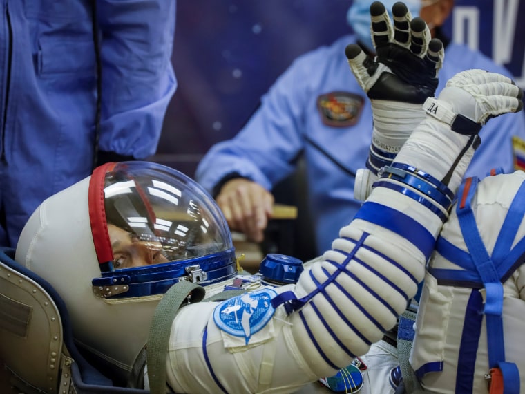 Image: The International Space Station (ISS) crew members Joe Acaba of the the U.S., looks on during his space suit check shortly before their launch at the Baikonur Cosmodrome