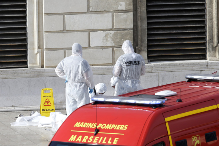 Image: Investigative police officers work outside Marseille 's main train station onOct. 1, 2017 in Marseille, southern France.