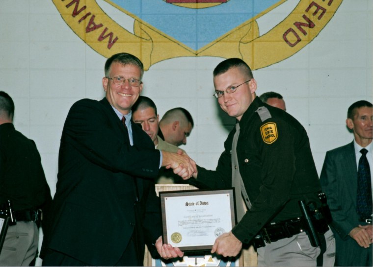 Mike Haugen is sworn in as an Iowa State Patrolman in 2006.