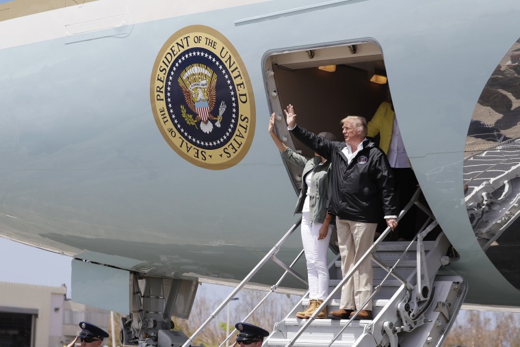 Image: President Donald Trump and first lady Melania Trump arrive at Luis Muniz Air National Guard Base