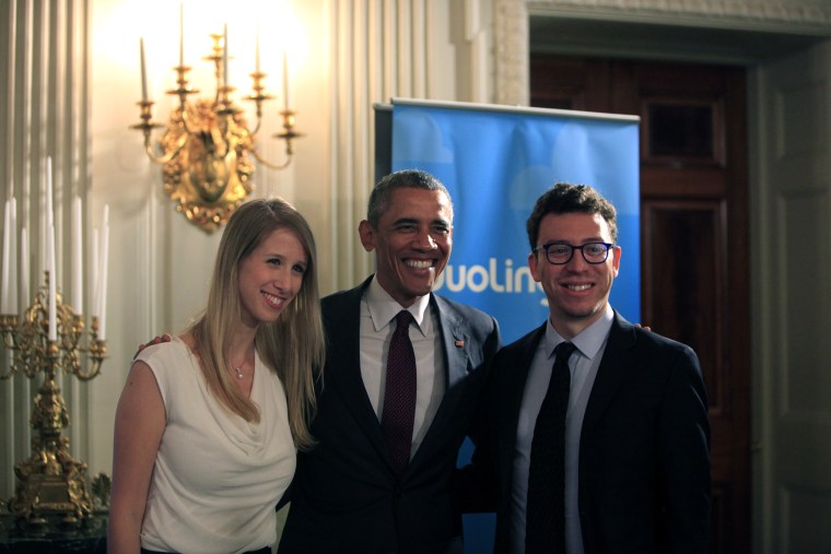 Duolingo co-founder Luis von Ahn poses for a photo at the White House with President Barack Obama.