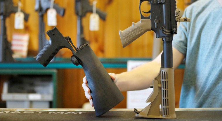 A bump fire stock that attaches to a semi-automatic rifle to increase the firing rate is seen at Good Guys Gun Shop in Orem