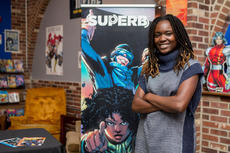 Dr. Sheena Howard poses with the cover art from her book, "Superb"