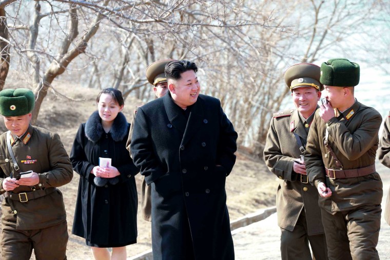 Image: North Korean leader Kim Jong-un touring a military unit on an island off the North Korean mainland near the sea border with South Korea in the East Sea. Kim's younger sister, Yo-jong, is seen behind.