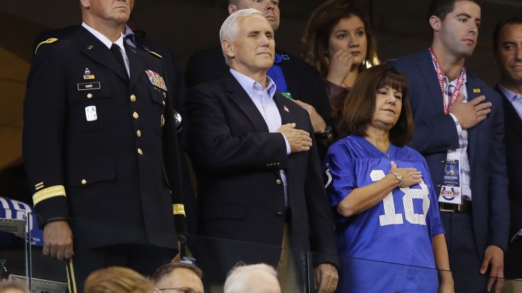 Vice President Mike Pence, front center, stands during the playing of the national anthem before an NFL football game between the Indianapolis Colts and the San Francisco 49ers, Sunday, Oct. 8, 2017, in Indianapolis. (AP Photo/Michael Conroy)