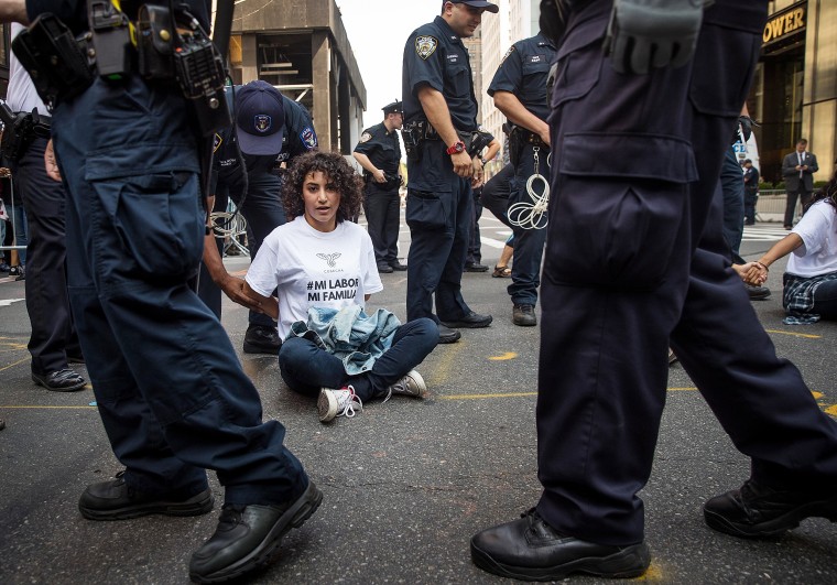 Image: Immigration activists are arrested as they protest the Trump administration's decision on DACA