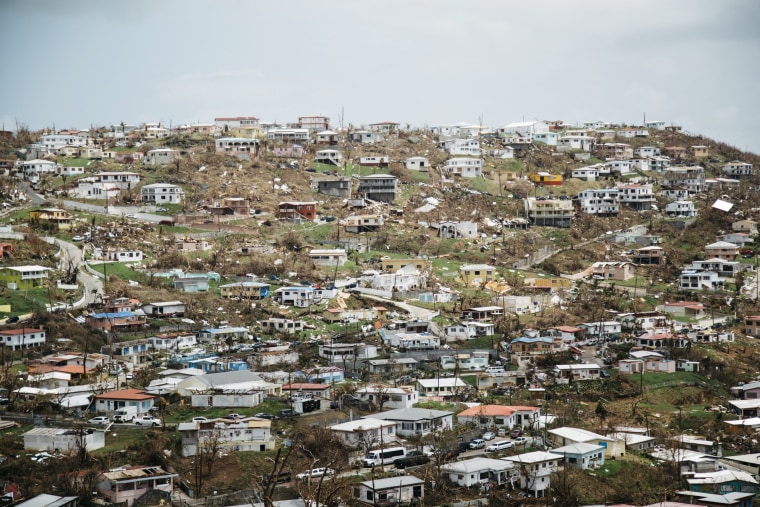 Damaged houses line a hillside in Old Tutu following Hurricane Irma in St. Thomas, U.S. Virgin Islands, on Sept. 11.