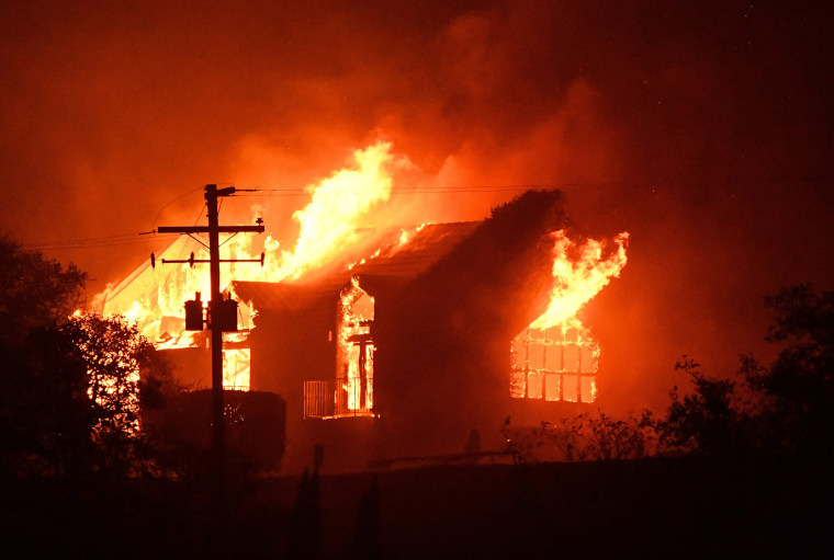 Image: The Signorello Estate winery burns in the Napa wine region of California