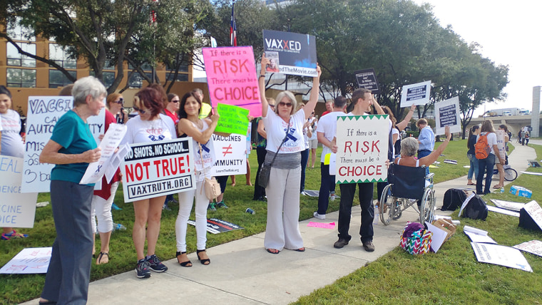 Anti-vaccine activists demonstrate in Houston in August 2017. They don't believe the preponderance of evidence that vaccines are safe and will protect children and adult against life-threatening diseases, and are becoming bolder in their outreach.
