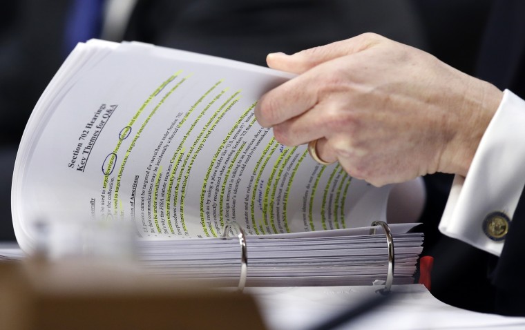 Image: Rosenstein looks through his notes during a Senate Intelligence Committee hearing