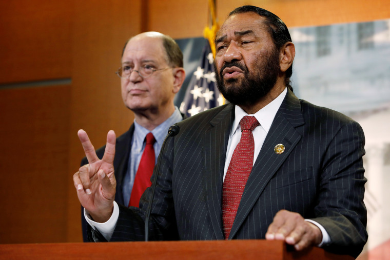 Rep. Al Green (D-TX), accompanied by Rep. Brad Sherman (D-CA), speaks with the media about his plans to draft articles of impeachment against President Donald Trump on Capitol Hill in Washington