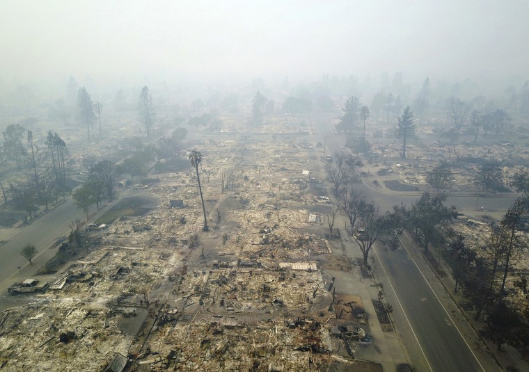 Image: This aerial image shows a neighborhood that was destroyed by a wildfire in Santa Rosa, Calif.,