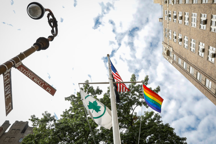 Image: The Rainbow Flag, a symbol of LGBTQ freedom, flies over the Stonewall National Monument following a dedication ceremony in New York