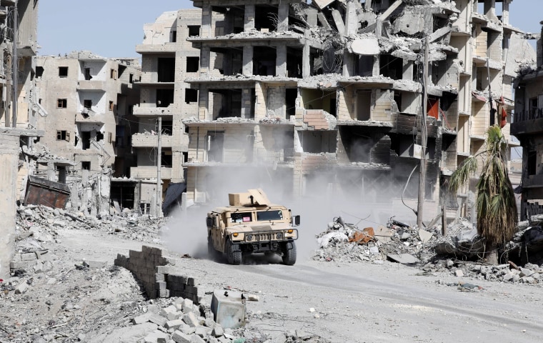 Image: An armoured vehicle of the Syrian Democratic Forces in Raqqa