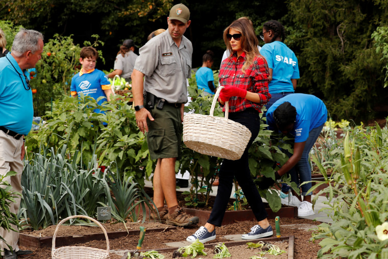Image: Melania Trump works in the White House garden with children from the Boys and Girls Clubs at the White House in Washington