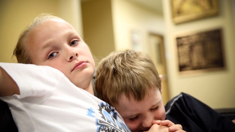 TAMPA, FL: Shaelyn, 10 and her brother Ayden, 9 sit together at the Children's Home Network, a non-profit that helps at-risk children and their families.