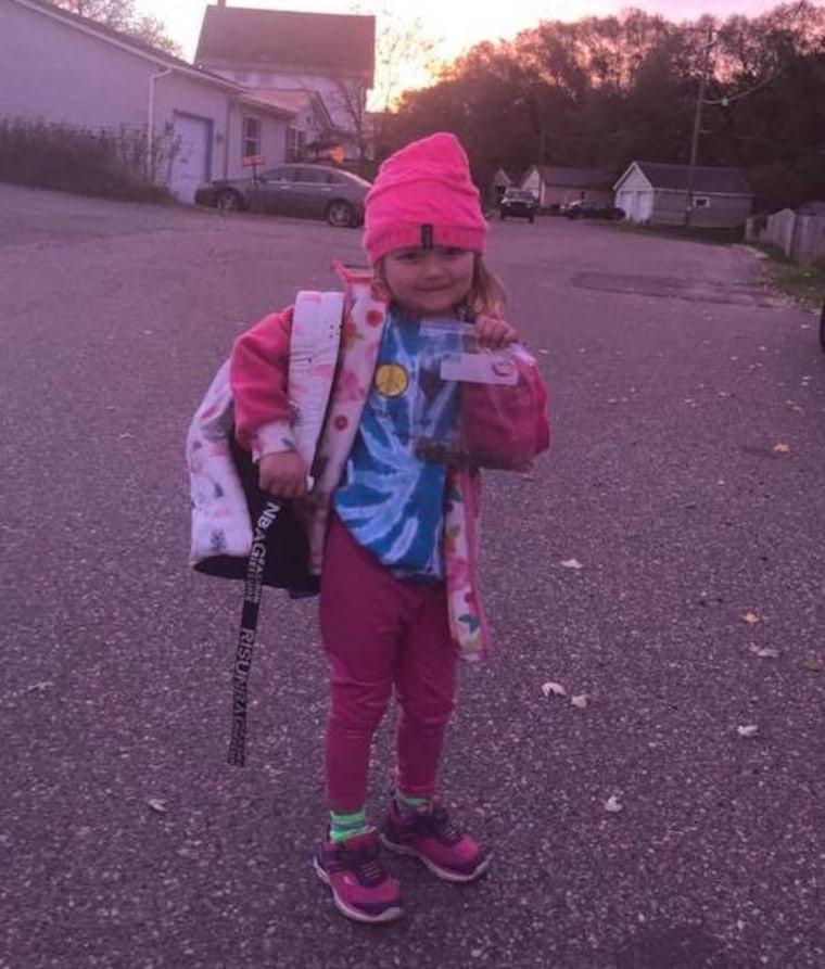 Sunshine carried her donated milk money to school in a plastic, zip-loc bag.