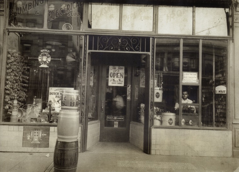 Jose Mora (in the small window), from Aragon Spain, owned and ran Fifth Avenue Hardware, which was directly across the street from Gregorio Bustelo's first storefront, on Fifth Avenue, in the heart of the neighborhood that was becoming known in the 1930s as "El Barrio" or Spanish Harlem.