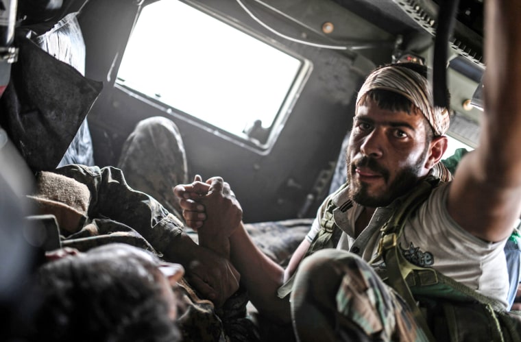Image: SYRIA-CONFLICT-RAQA