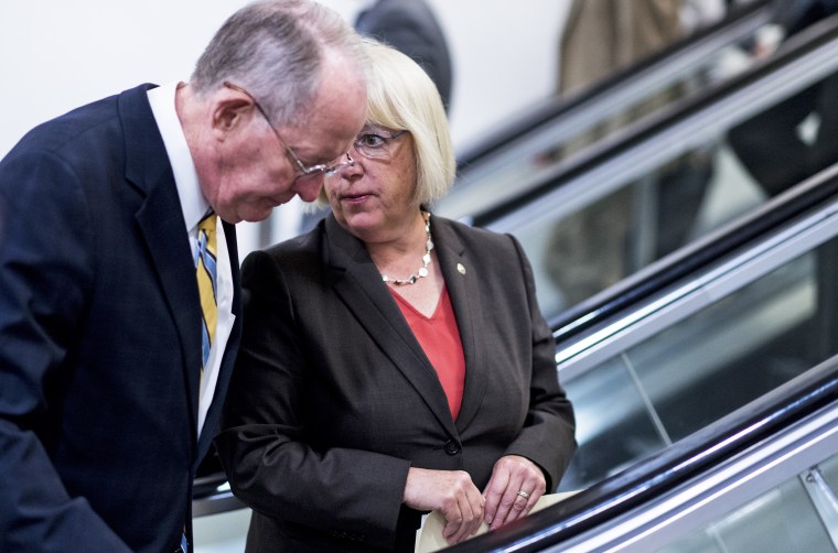 Image: Sen. Lamar Alexander, R-Tenn., speaks with Sen. Patty Murray, D-Wash.