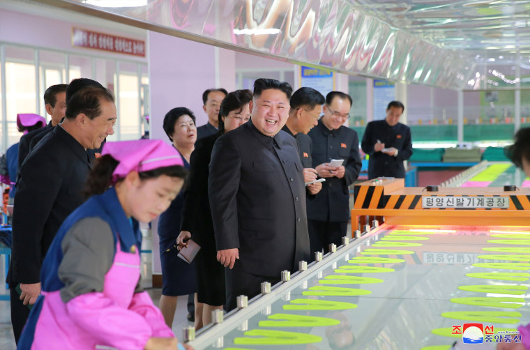 Image: Kim Jong Un visits a footwear factory