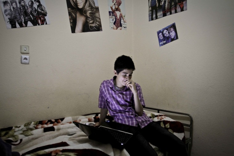 Image: Arkan, 20, chats with his girldfirend on Skype in central Turkey in 2012