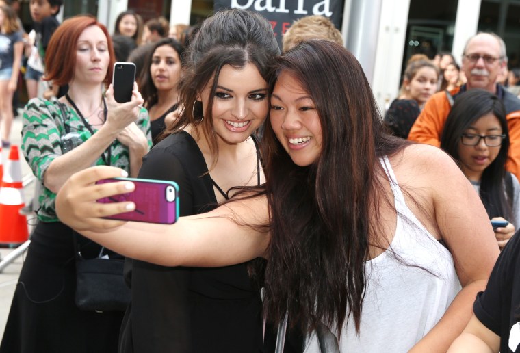 Image: Rebecca Black takes a selfie with a fan