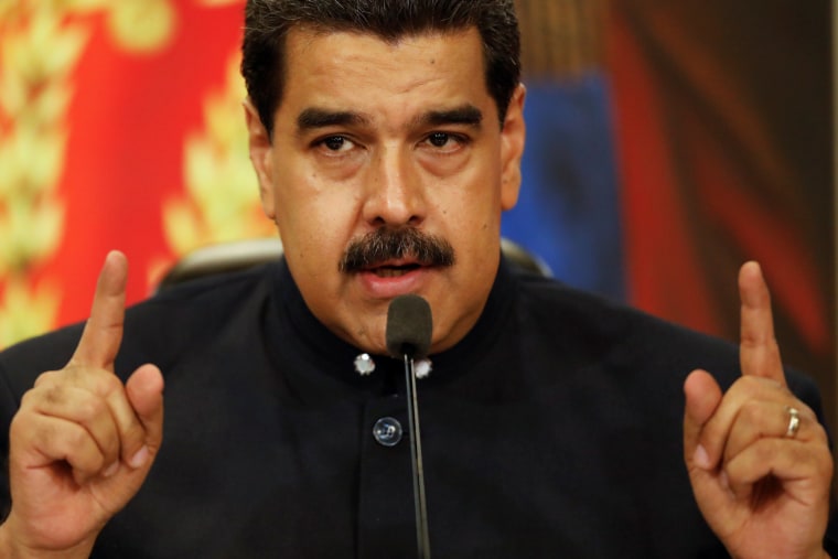 Image: Venezuela's President Nicolas Maduro talks to the media during a news conference at Miraflores Palace in Caracas