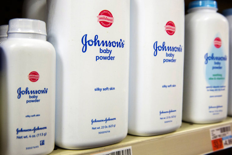 Image: Bottles of Johnson & Johnson baby powder line a drugstore shelf in New York