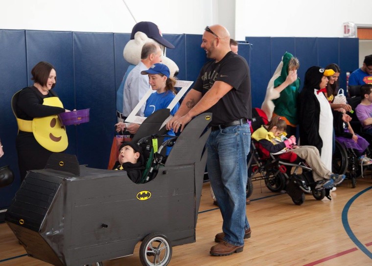 Ryan Hebert, 8, made an adorable Batman in his own Batmobile.