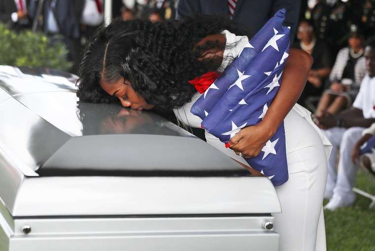 Image: Myeshia Johnson kisses the casket of her husband U.S. Army Sgt. La David Johnson