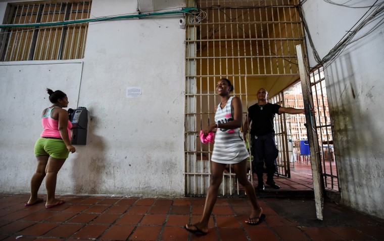 Image: Inmate Arleth Martinez walks in the San Diego jail in Cartagena