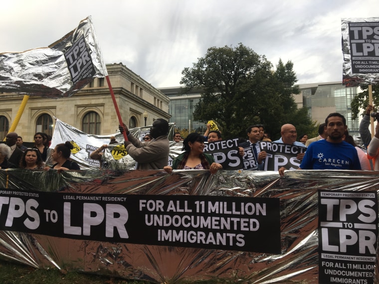 Dozens of Temporary Protected Status (TPS) holders gather outside Department of Homeland Security office to demand an extension for TPS. The groups is comprised of delegates from 21 different organizations from across that country.