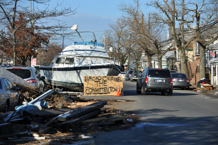 Image: A boat and other debris sit in the Broad Channel after Sandy in 2012