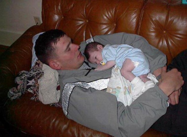 Image: Soldier Holds Son