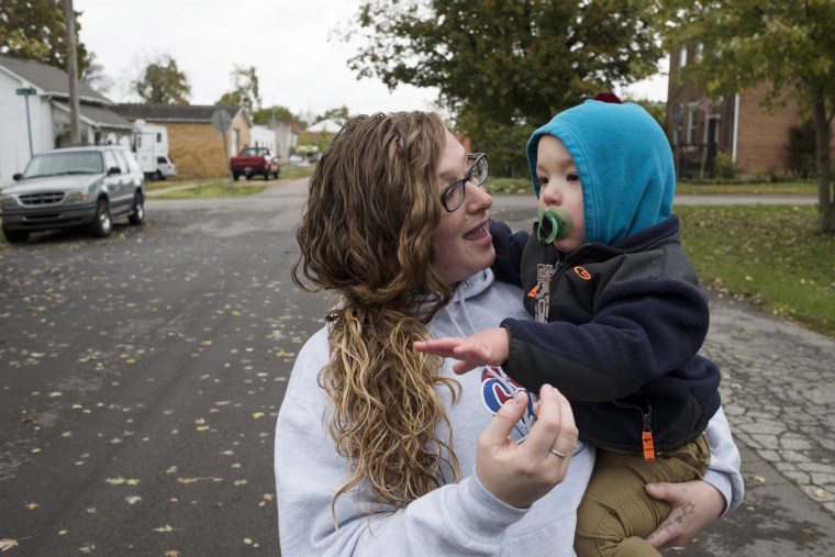 Image: Erika Hurt holds her son