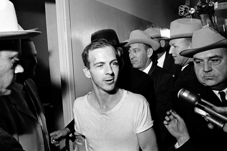 Image:  Lee Harvey Oswald talks to the media