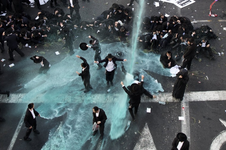 Image: Ultra-Orthodox Jews protest against army recruitment