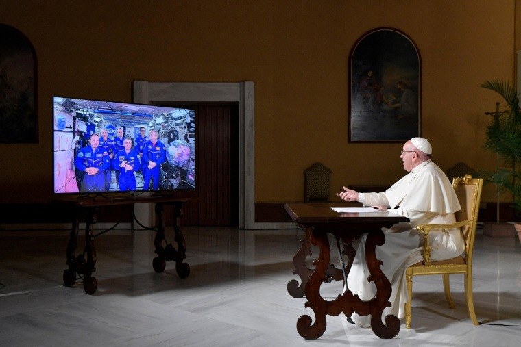 Image: Pope Francis talks with crew members of the International Space Station, ISS Expedition 53, during an audio-video connection at the Vatican