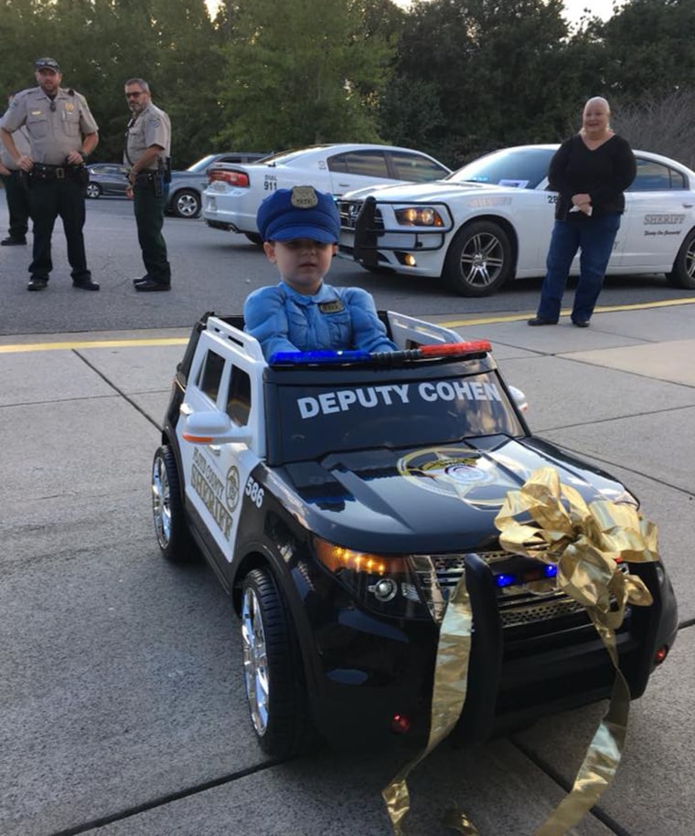 Cohen doesn't quite understand the community reaction, but he loves meeting police officers and living out his love for law enforcement.