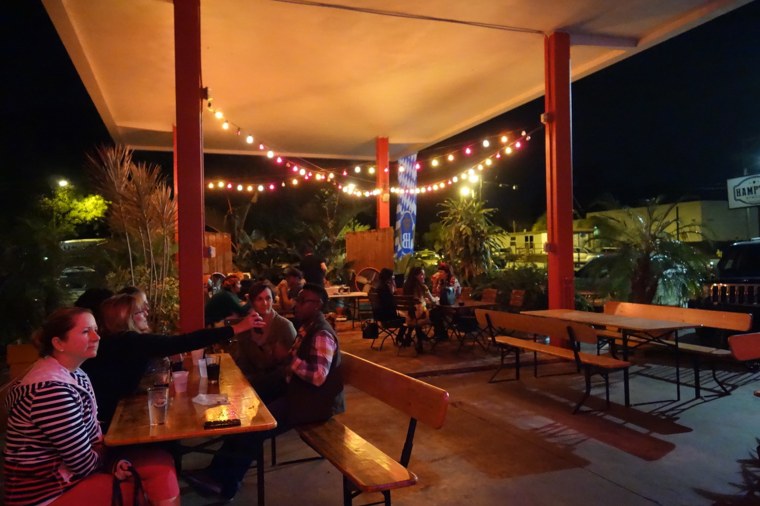 Hampton Station's outdoor patio, at night.