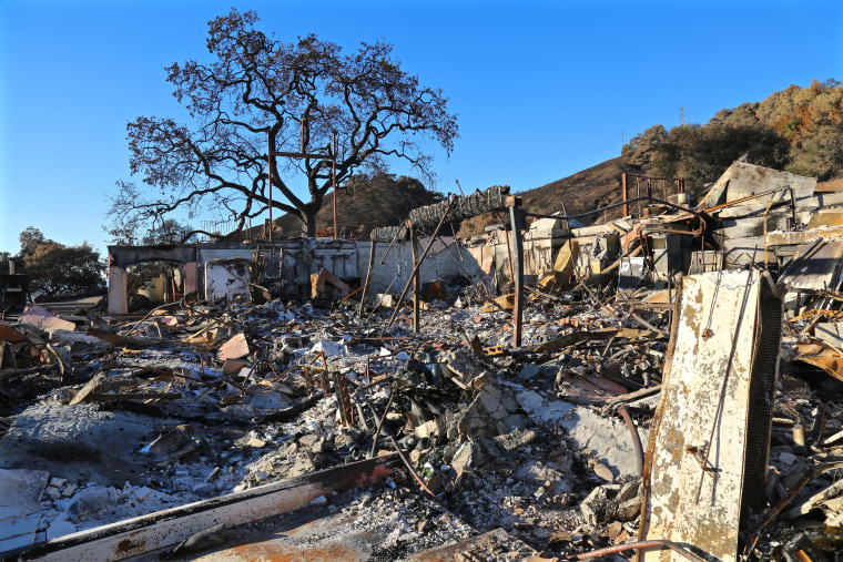 The two-story tasting room and hospitality center for Paradise Ridge Winery in Santa Rosa, now reduced to ash and twisted metal.