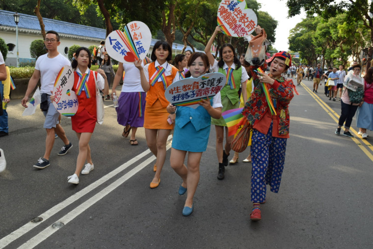 Parade-goers march in the 15th annual pride LGBT parade in Taipei, Taiwan. This year's event drew an estimated 123,000 people.