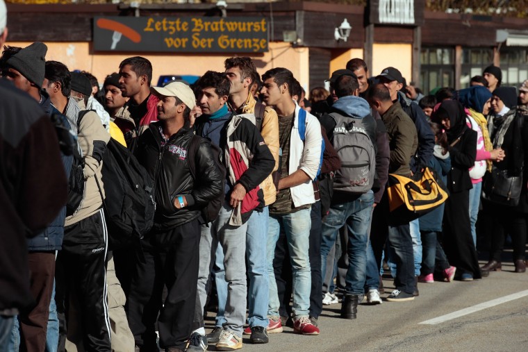 Image: Migrants arrive at Austrian-German border on Oct. 28, 2015