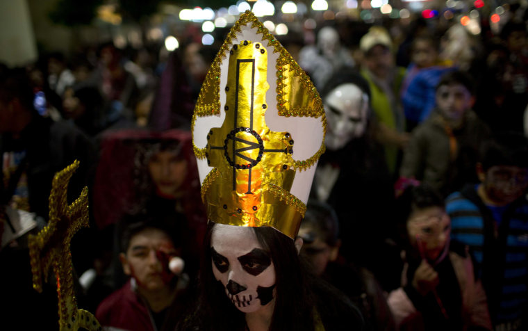 Image: A woman dressed as a Catholic priest zombie participates in the annual Zombie Walk in La Paz, Bolivia on Oct. 28.
